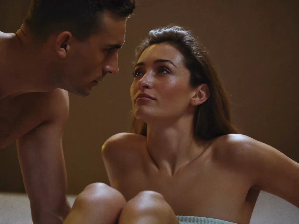 intimate close moment between man and woman faces close together showing emotional and sexual tension without physical contact