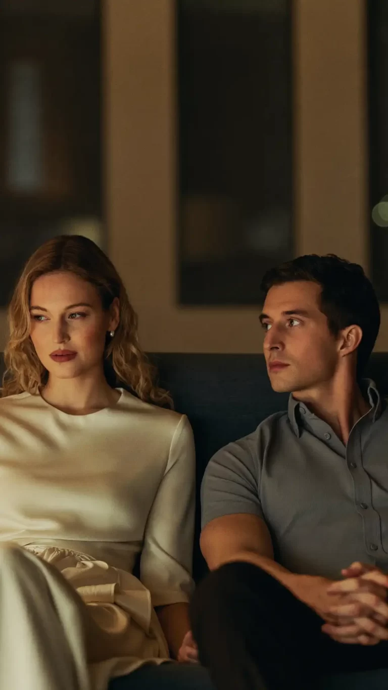 unspoken connection between a man and woman in a softly lit intimate setting